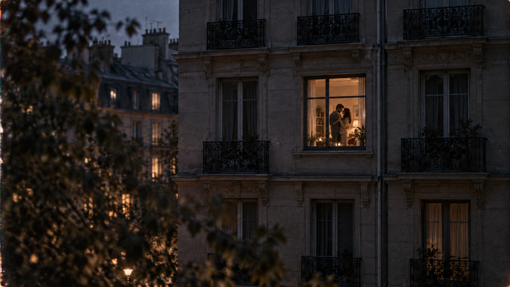 Five love languages illustrated by a couple dancing in a lit apartment window at dusk.