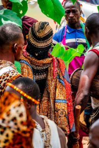 People gathered in community, illustrating relational themes in ubuntu philosophy.